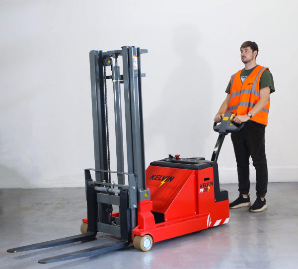 Warehouse worker operating a red Kelvin PF09 electric pallet stacker indoors