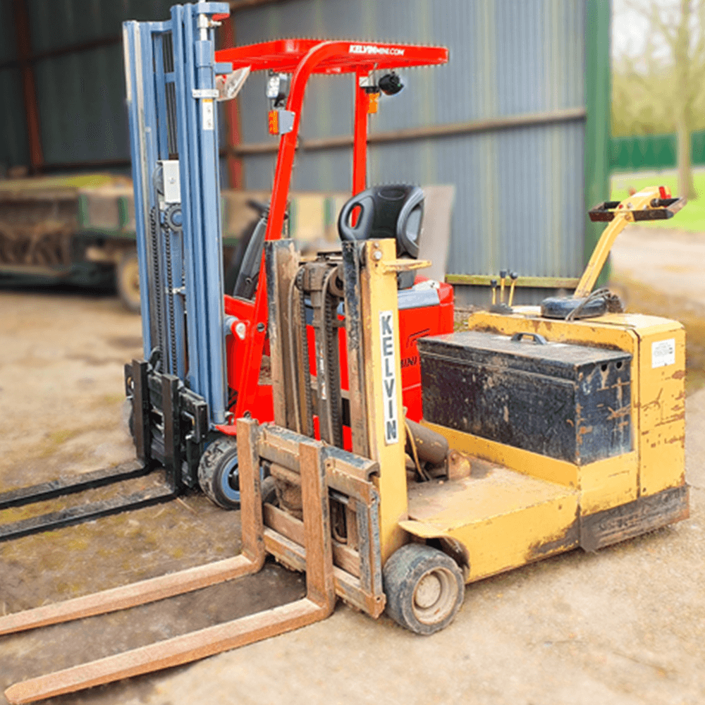 two-generations-of-forklifts-side-by-side